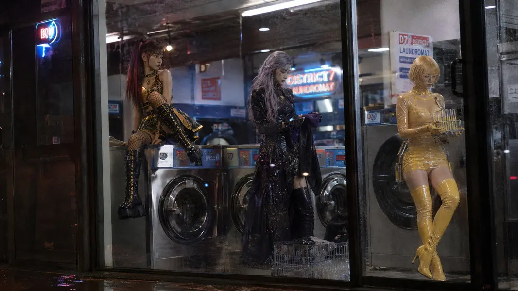 Burning Fruit Girls — Hami, Ning, Grape: LAUNDROMAT WINDOW. Off-duty record at District 7 laundromat.
